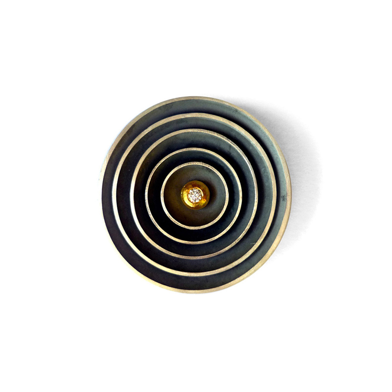 All Returns to the Centre, brooch, 31mm diameter, sterling silver, 24ct gold, diamond, 2009