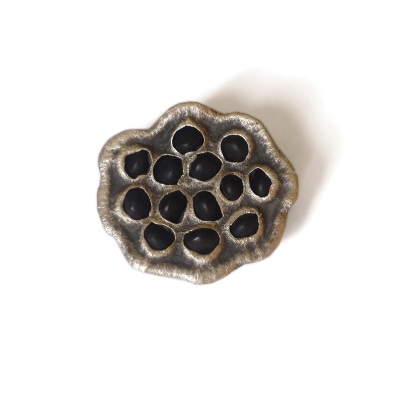 New Potential, Kate Alterio & Claire Beynon, brooch, 30mm x 27mm sterling silver, seeds, 2009